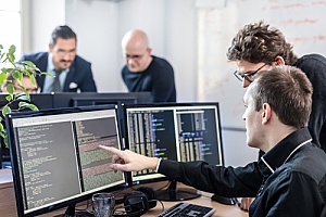 IT team testing network security at a security operations center